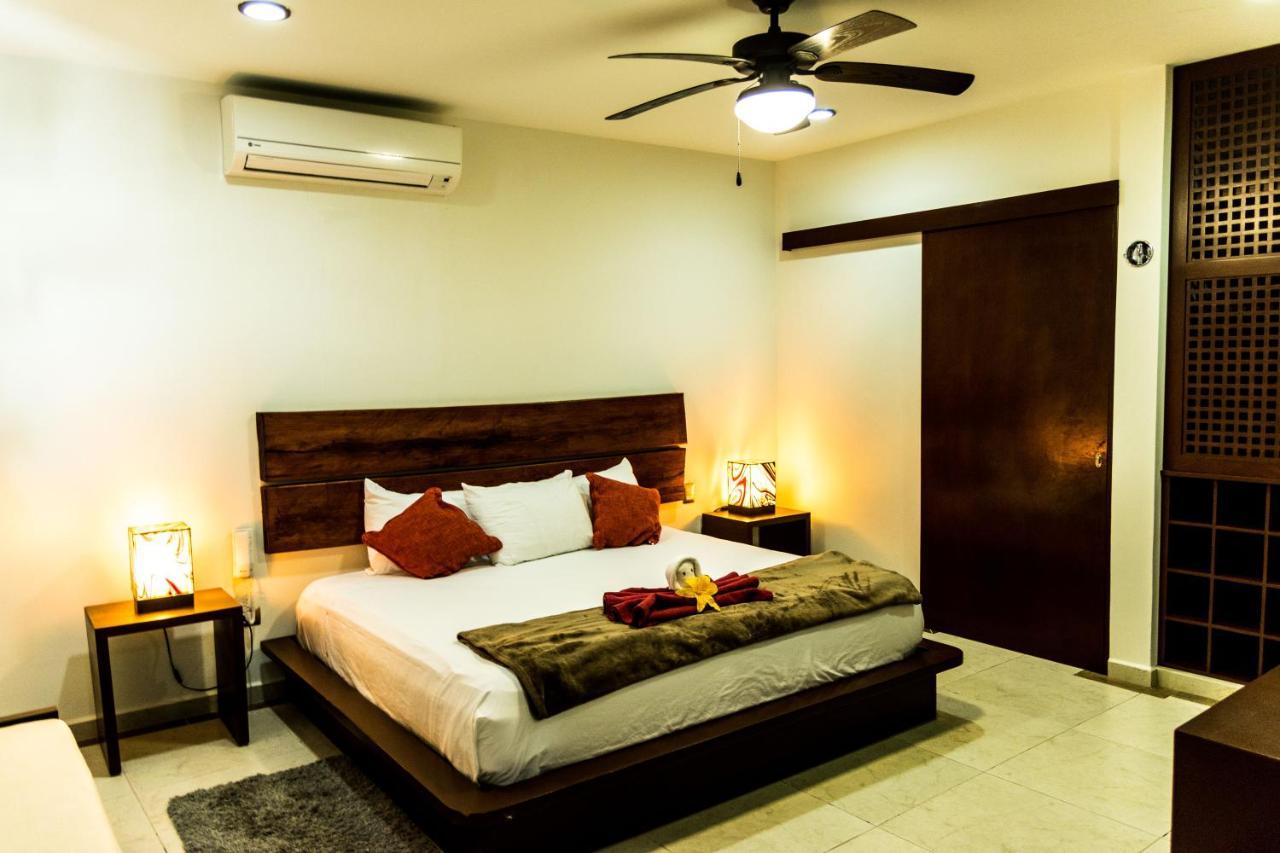 Casa Ticul Hotel Boutique - 5Th Ave (Adults Only) Плая-дель-Кармен Экстерьер фото A bedroom at the hotel
