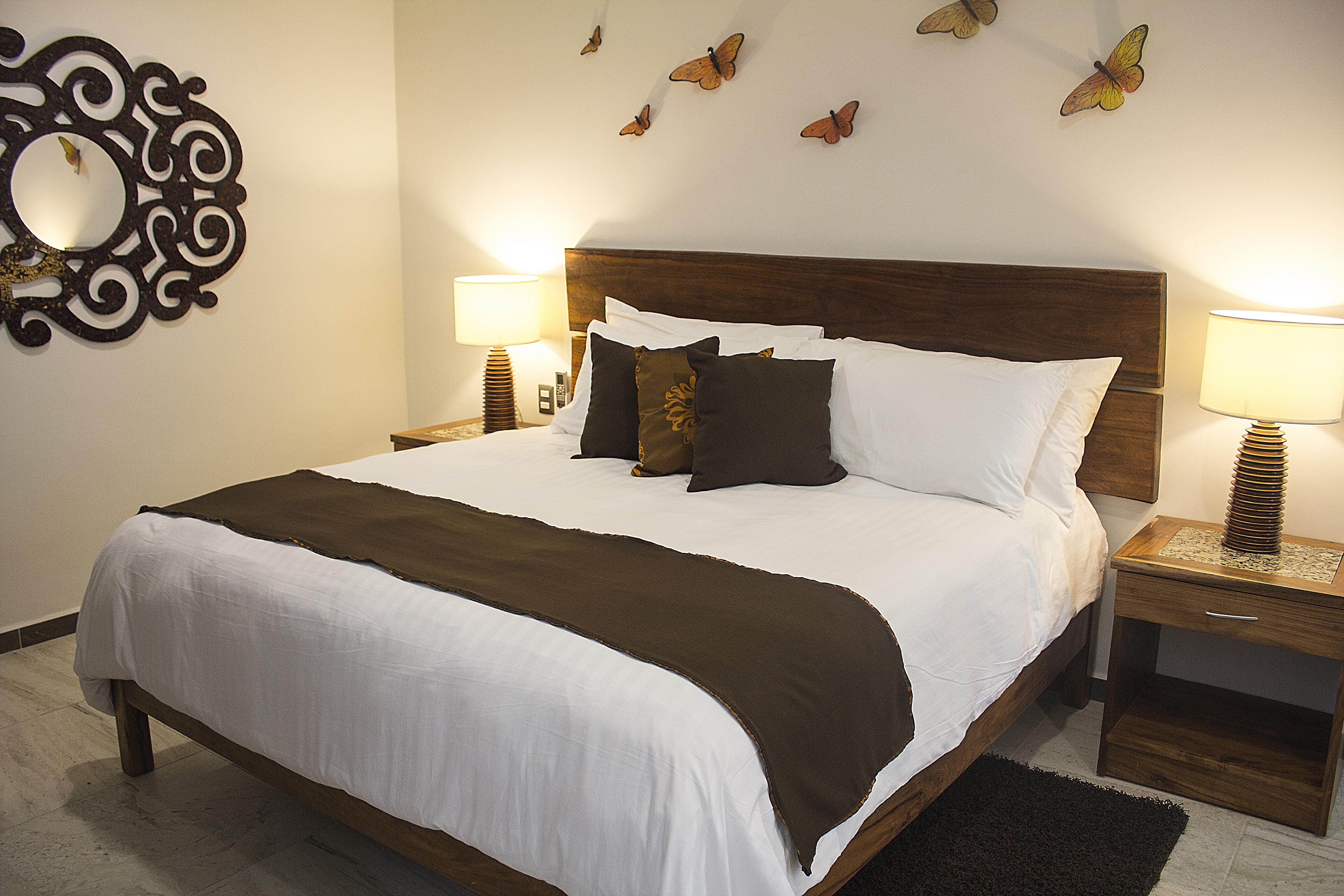Casa Ticul Hotel Boutique - 5Th Ave (Adults Only) Плая-дель-Кармен Экстерьер фото A bed with a bed runner