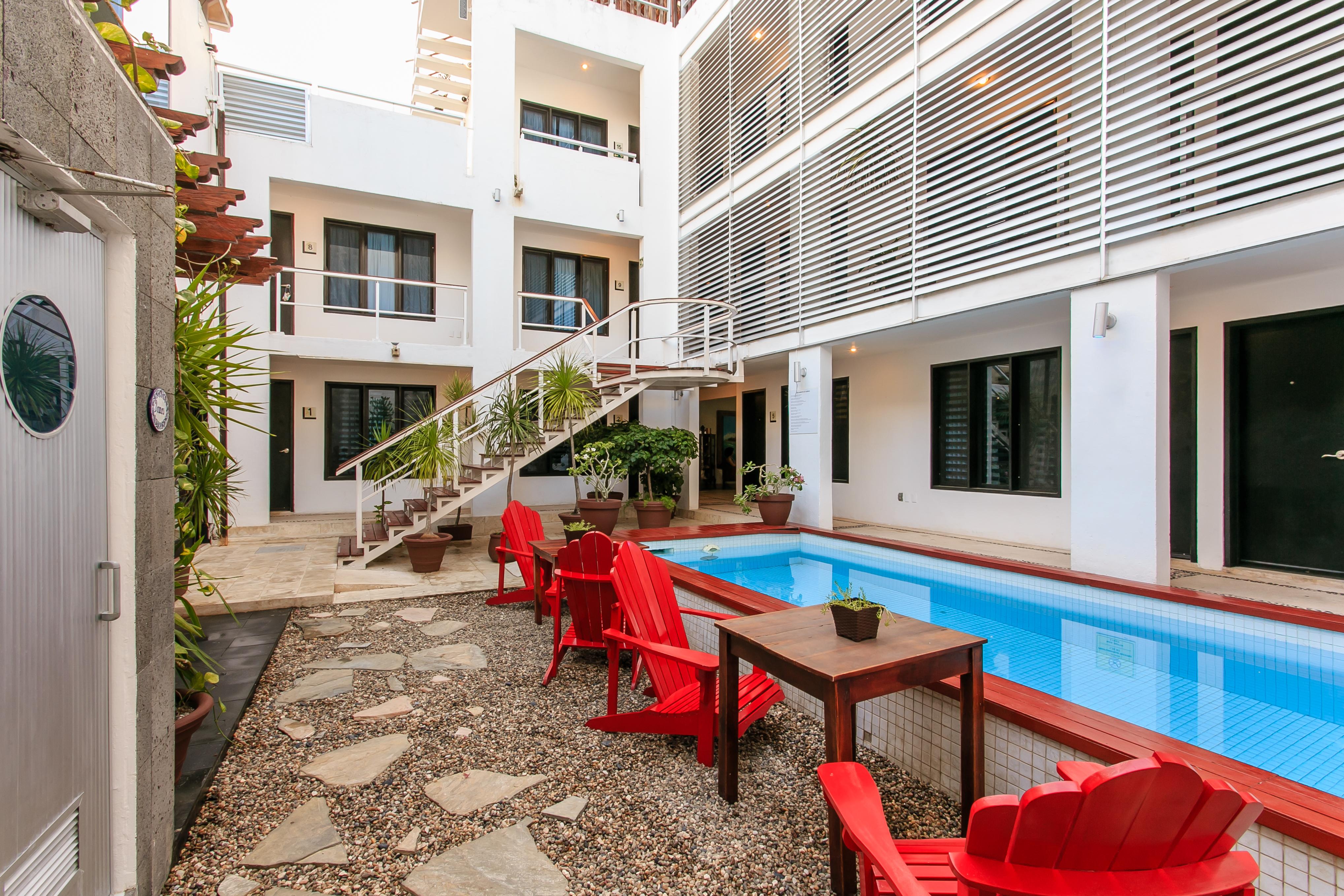 Casa Ticul Hotel Boutique - 5Th Ave (Adults Only) Плая-дель-Кармен Экстерьер фото The Hotel's courtyard