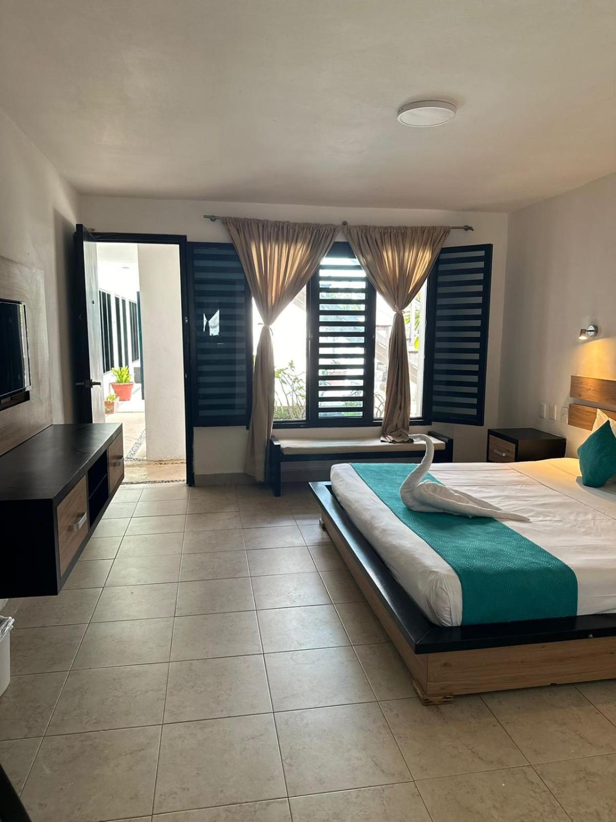 Casa Ticul Hotel Boutique - 5Th Ave (Adults Only) Плая-дель-Кармен Экстерьер фото A room at the hotel