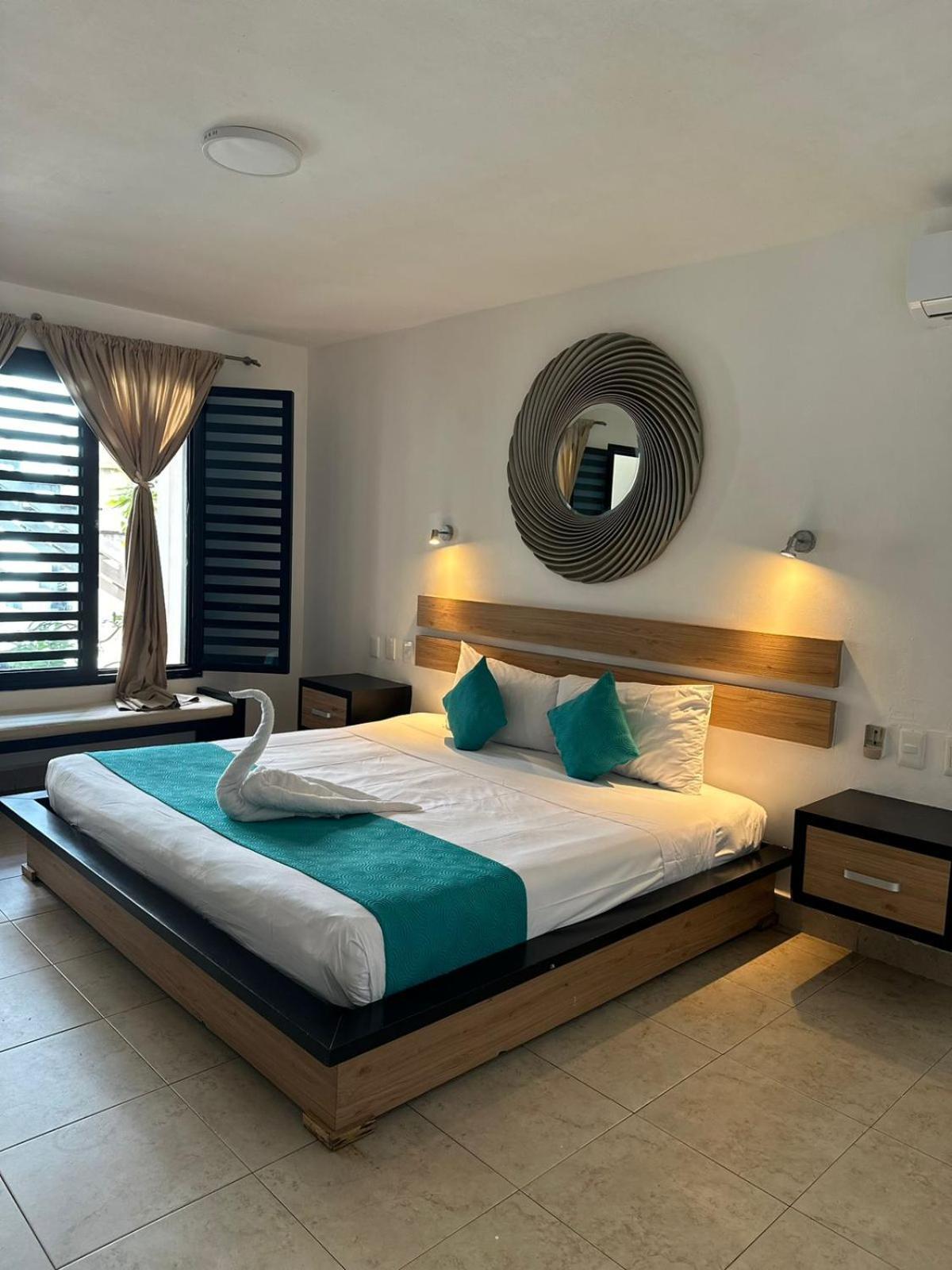 Casa Ticul Hotel Boutique - 5Th Ave (Adults Only) Плая-дель-Кармен Экстерьер фото A bedroom at the hotel