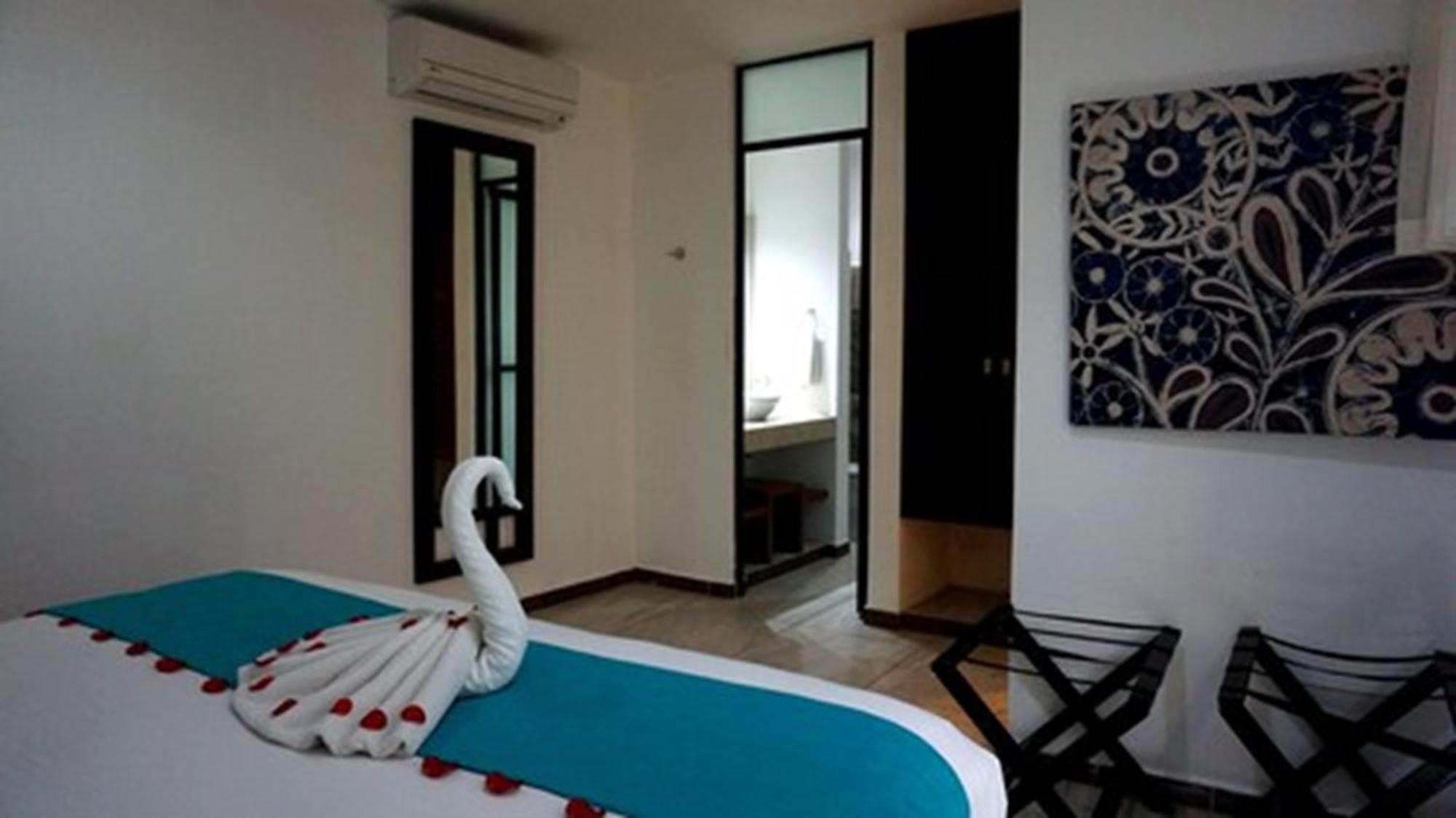 Casa Ticul Hotel Boutique - 5Th Ave (Adults Only) Плая-дель-Кармен Экстерьер фото A room at the hotel